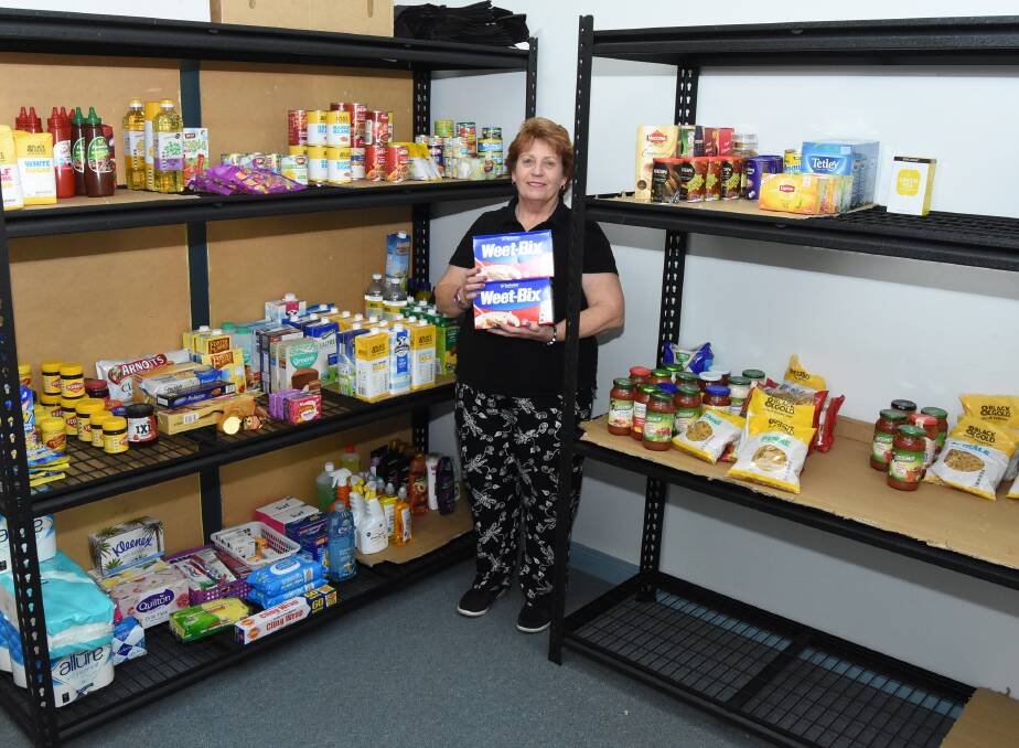 Corner store: Angela Simmonds is helping to coordinate the supply and distribution of food to those in need. Photo: Mark Logan.