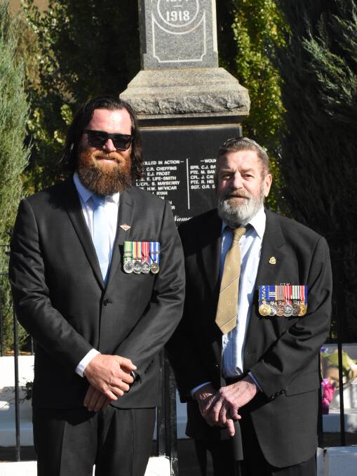Family support: It was a special Anzac Day ceremony for father and son Jack and Geoff Braddon. Photo: Mark Logan.