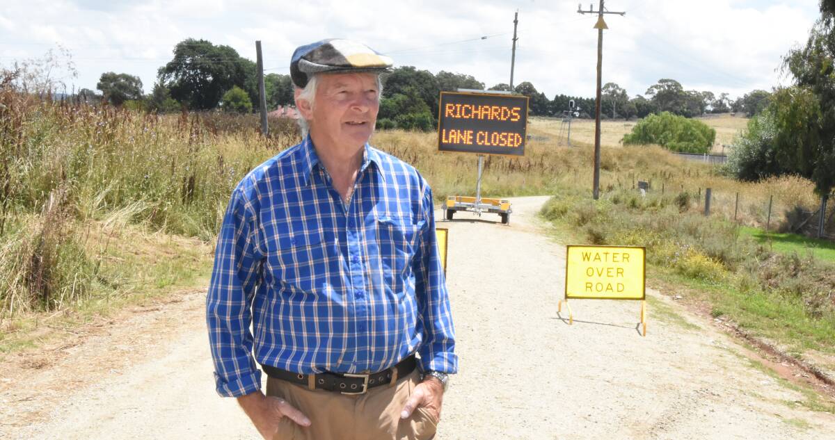 BLOCKED: Gerry Faulkner at one of the two Variable Message Signs that Blayney Shire Council have placed on Richards Lane. Photo: Mark Logan.