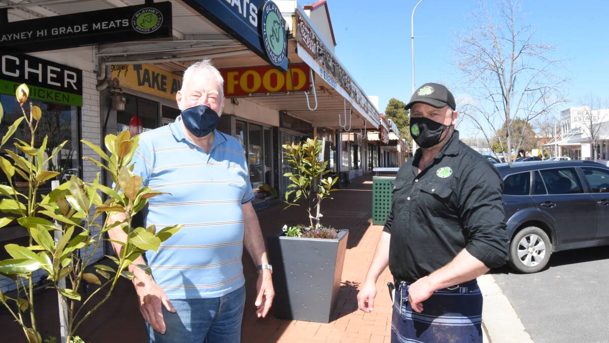 ROOM FOR IMPROVEMENT: Bill Burdett and Cameron Cassell believe that the community should brainstorm ideas to attract more trade onto the main street. Photo: Mark Logan.