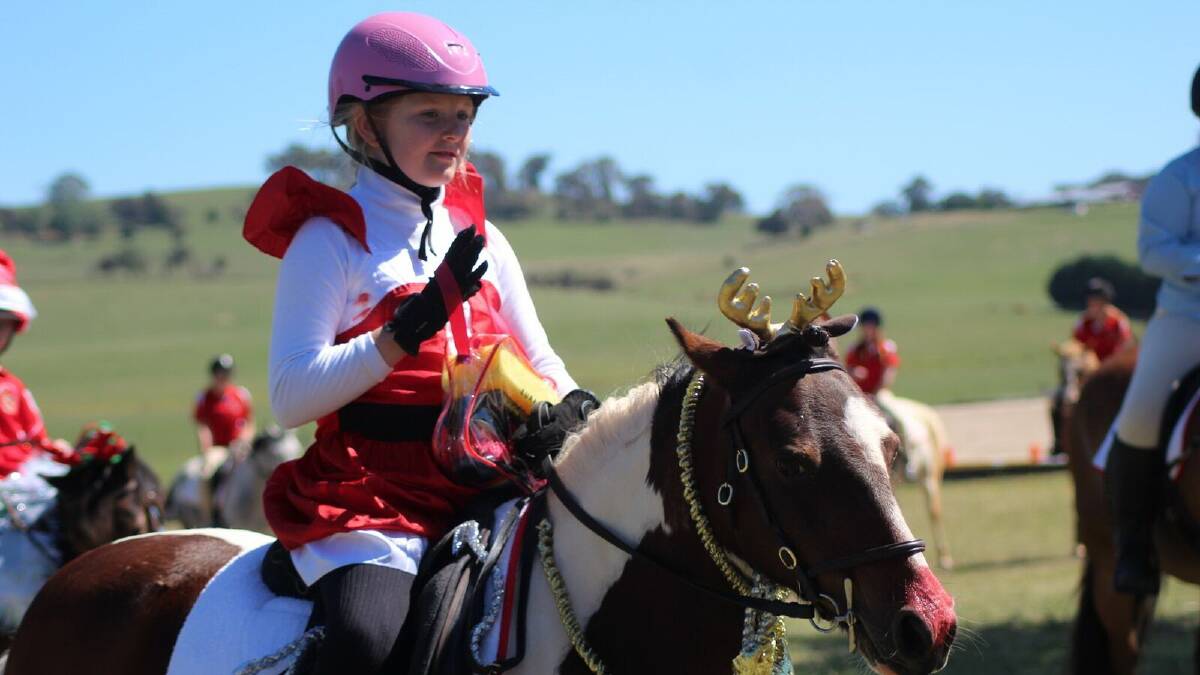 Fancy ride: MJ Murrell was riding high and fine in the saddle during the Christmas Rally Day. Photo: Contributed.