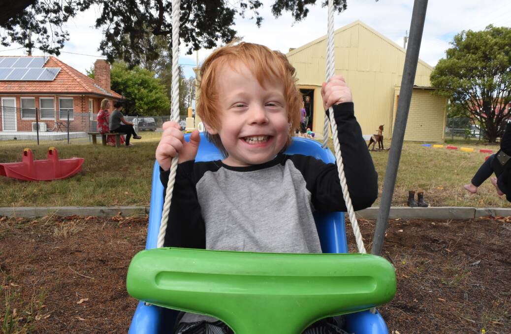 All smiles: Eli is a regular at the Bilby's Playgroup and he loves spending time on the group's great play equipment. Photo: Mark Logan.