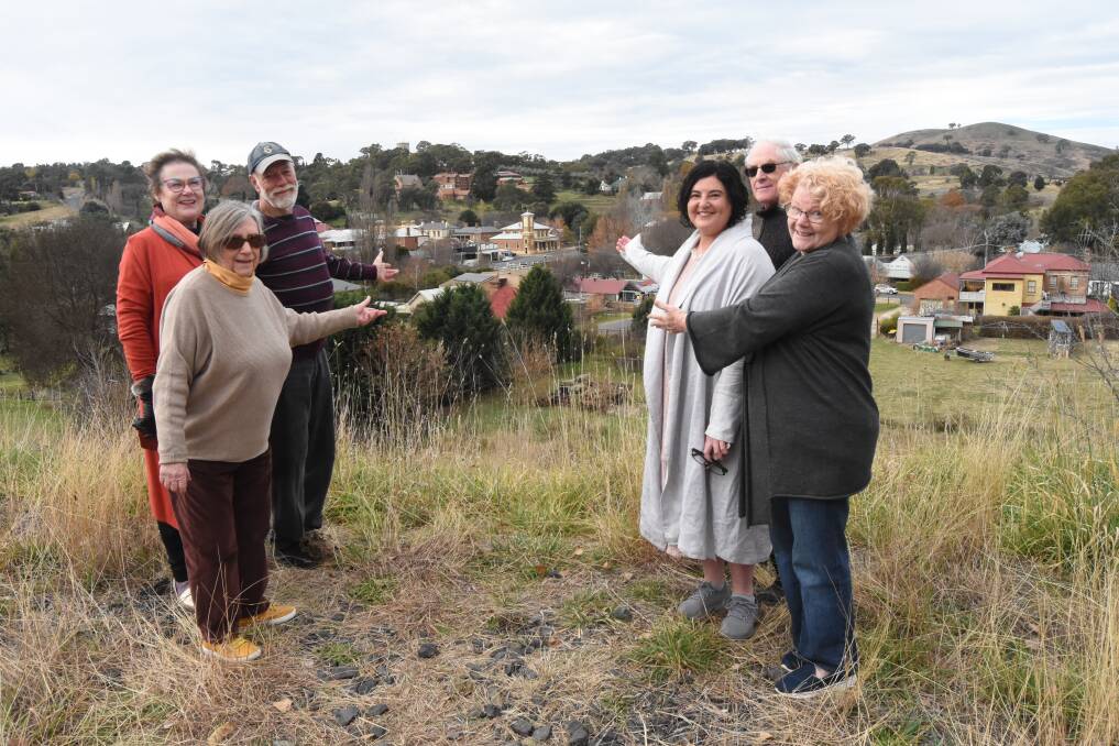 WELCOME: Libby Pickett, Lorraine Francis, Alan Griffiths, Kelly Picarazzi, Graham and Jan Steele welcome all new visitors to the village. Photo: Mark Logan.