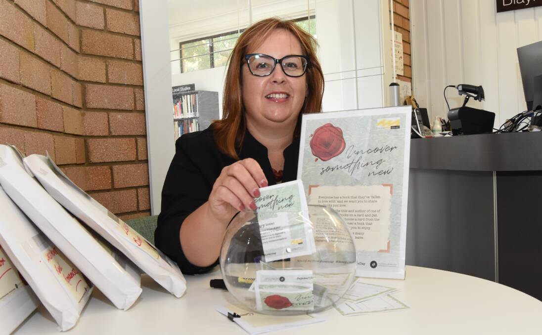 GOOD CHOICE: Blayney librarian Ruth Bingham with one of the book recommendation slips that readers can fill out for other readers at the library. Photo: Mark Logan.