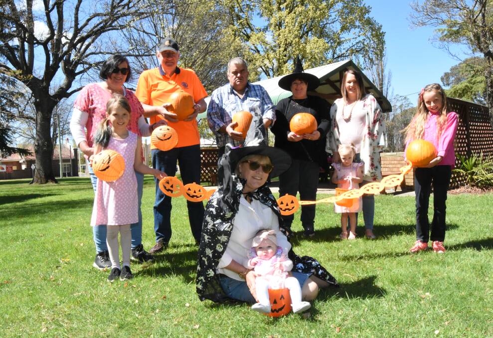Don't be spooked: Karen Somervaille with Penelope Whitten and members of the Rotary Club's Farmer's Market Committee.