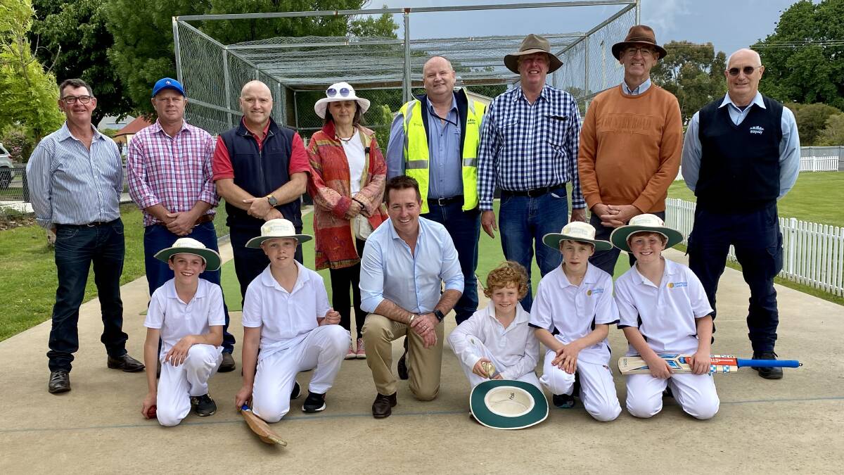 HOWZAT: Paul Toole with members of the Millthorpe junior cricket club and other officials at the current cricket nets in Millthorpe. Photo: Contributed. 
