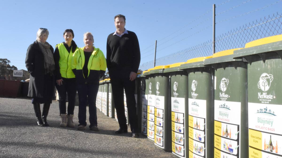 Rebecca Ryan, Tyanne Emblem, Candice Braddon and Mark Dicker with the new recycling bins that allow the free disposal of recyclable waste.