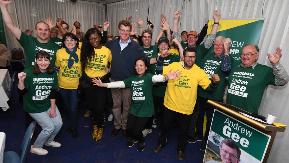 Andrew Gee and supporters on Saturday night. Photo: Jude Keogh