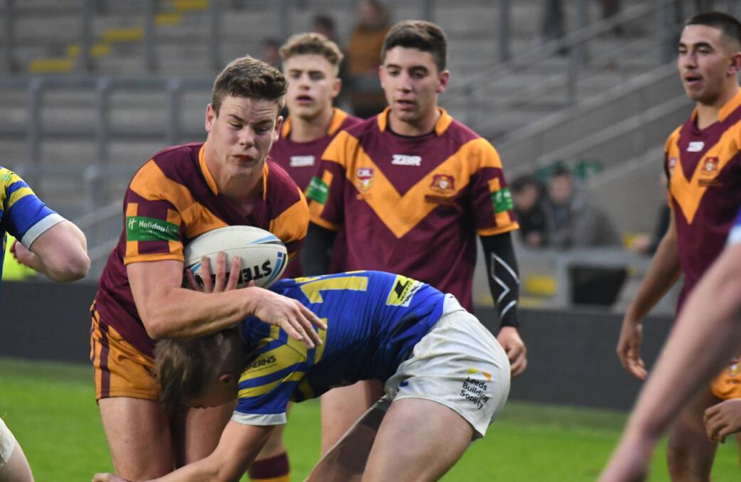 A smashing time: Liam Henry during the recent match against the Leeds Rhino's U18 side. Photo: Contributed.