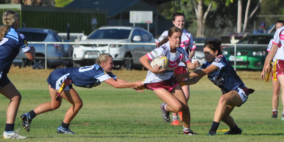 NOT GOING ANYWHERE: Bears gun Sophie Stammers is shut down by Hawks duo Ella-J Harris and Lailee Phillips earlier in the season.