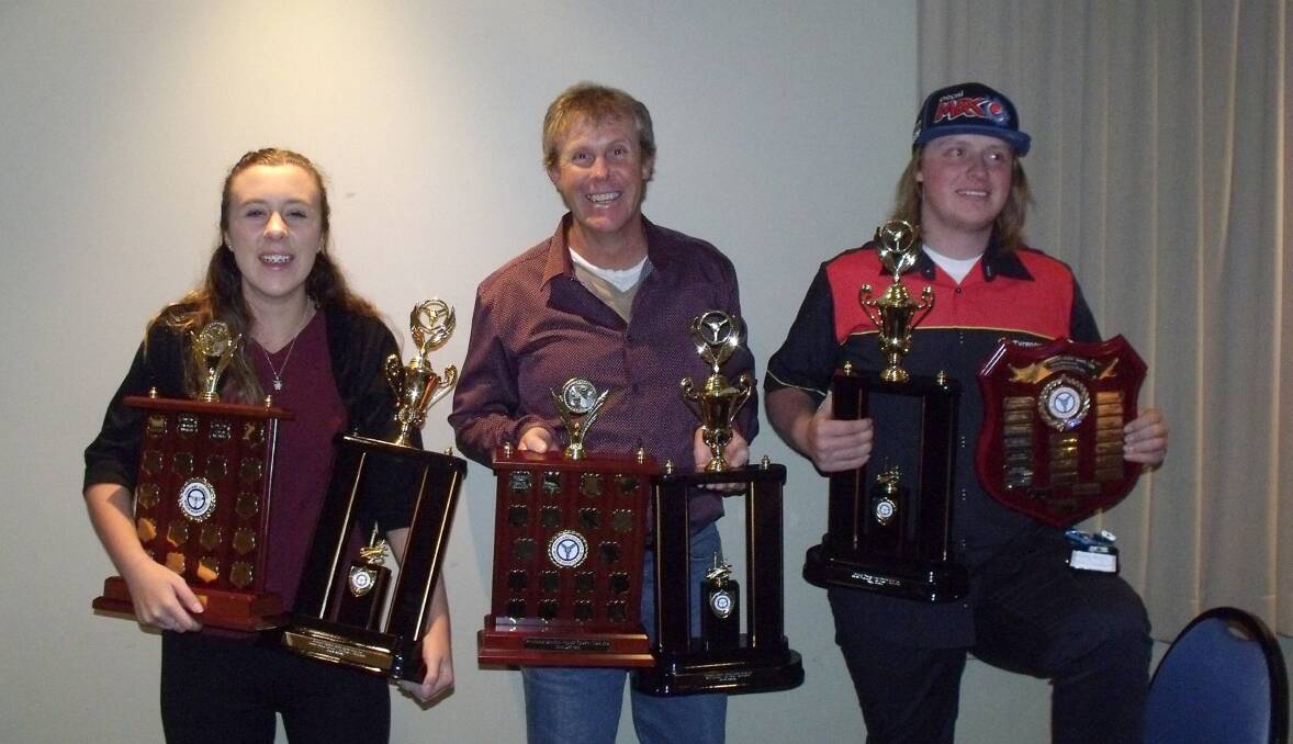 Going full throttle: Sarah, Bruce and Scott Bradley with their 1st place trophies they won at the Portland District Motor Sports Club presentation night. Photo:contributed