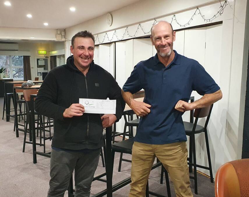 Steely determination: Pictured is our sponsor Gavin Cheney (Sootys Steel Erection Salter Cup) with the winner of Saturdays Trophy Nigel Habowski.