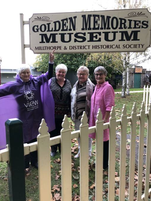 PURPLE POWER: Millthorpe VIEW club members Carolyn Woll (wearing the purple poncho) Rosemarie Amos, Lynne McCook and Virginia DeSantis. Photo: Contributed.