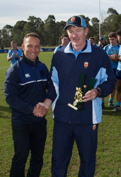 Top coach: Tony Tilburg was presented with an award following on from his success at coaching the CHS team to victory. Photo: Contributed.