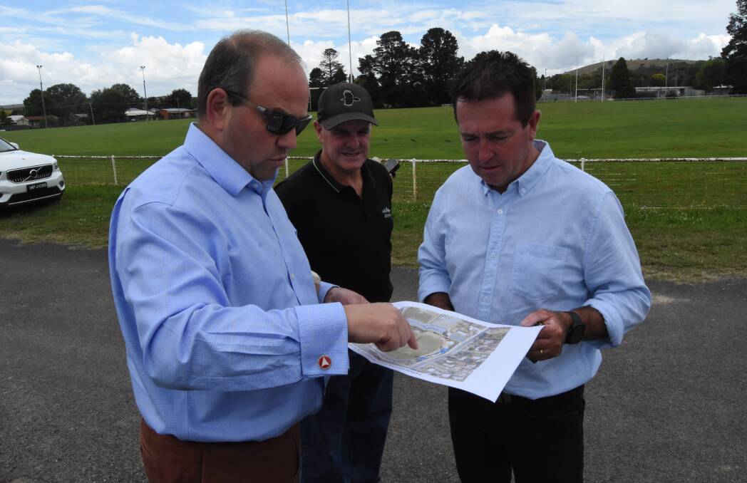 BIG PLANS: Grant Baker, John Newstead and Paul Toole checking out the plans for King George Oval. Photo: Mark Logan.