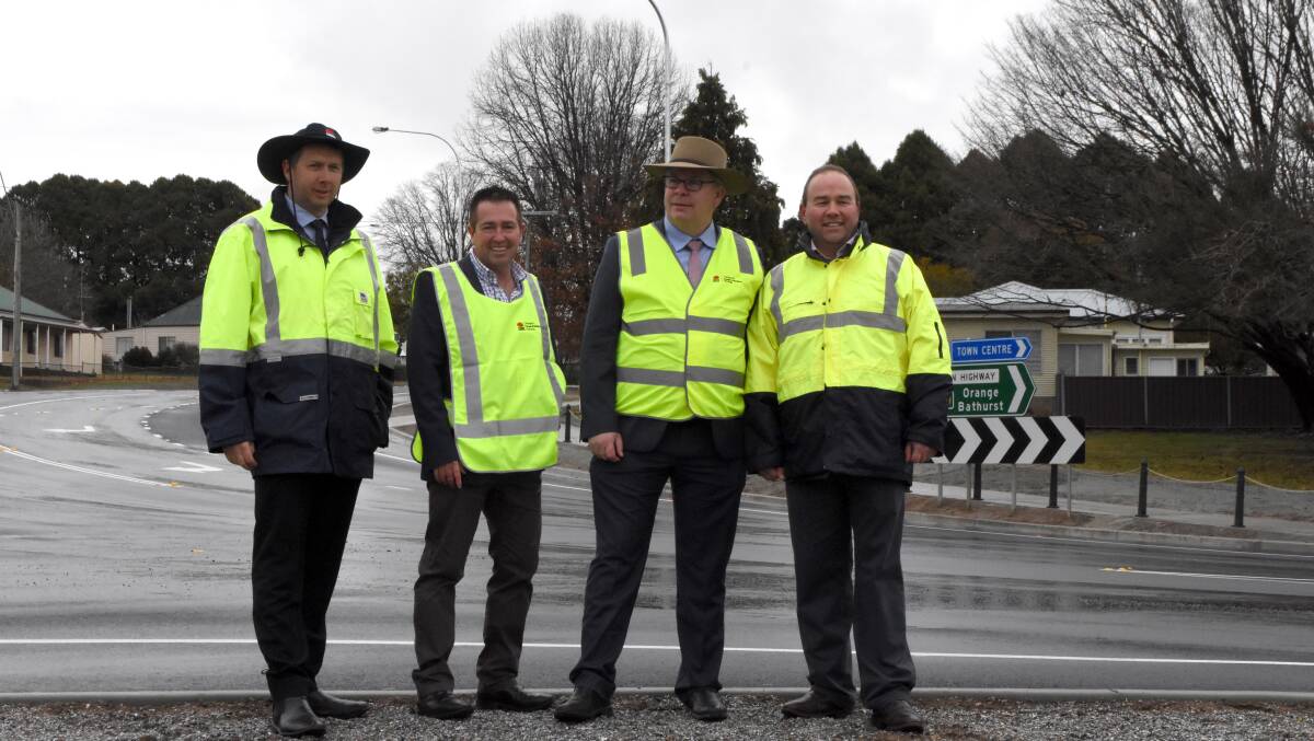 All ready: Dave Hendry, Paul Toole, Alistair Lunn and Grant Baker at the completed new intersection on the Mid-Western Highway. Photo: Mark Logan.