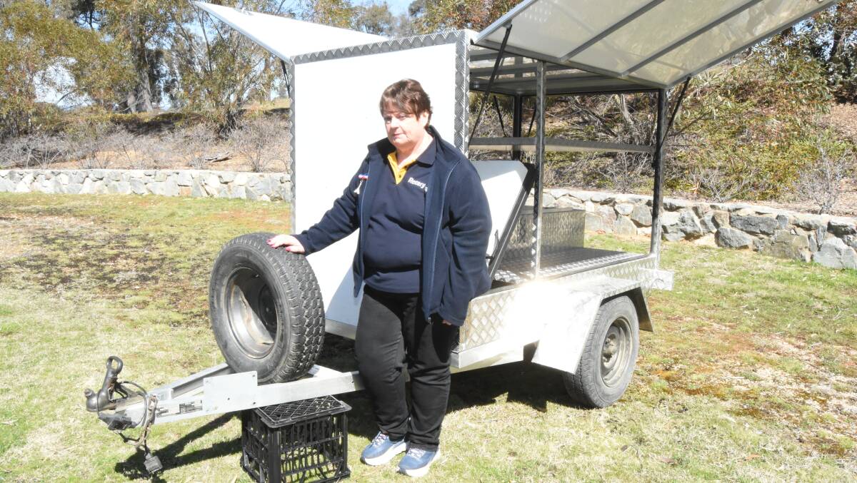 Gutted: Jane Whitten with the trailer that has had over $3,000 worth of equipment stolen from it including a custom made esky. Photo: Mark Logan.