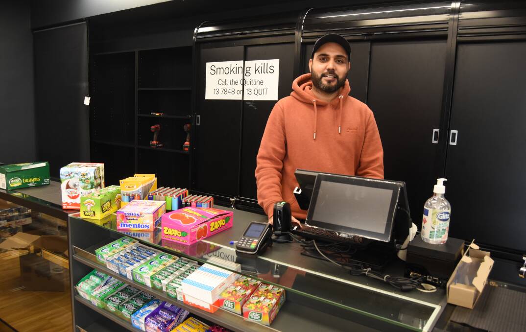 Owner of King of the Pack Blayney Gurinder Gosal is stacking the shelves in anticipation of opening up on Thursday.