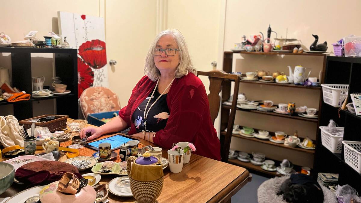 TREASURE TROVE: Deb Gittins with a selection of her vintage collectibles. Photo: Contributed.