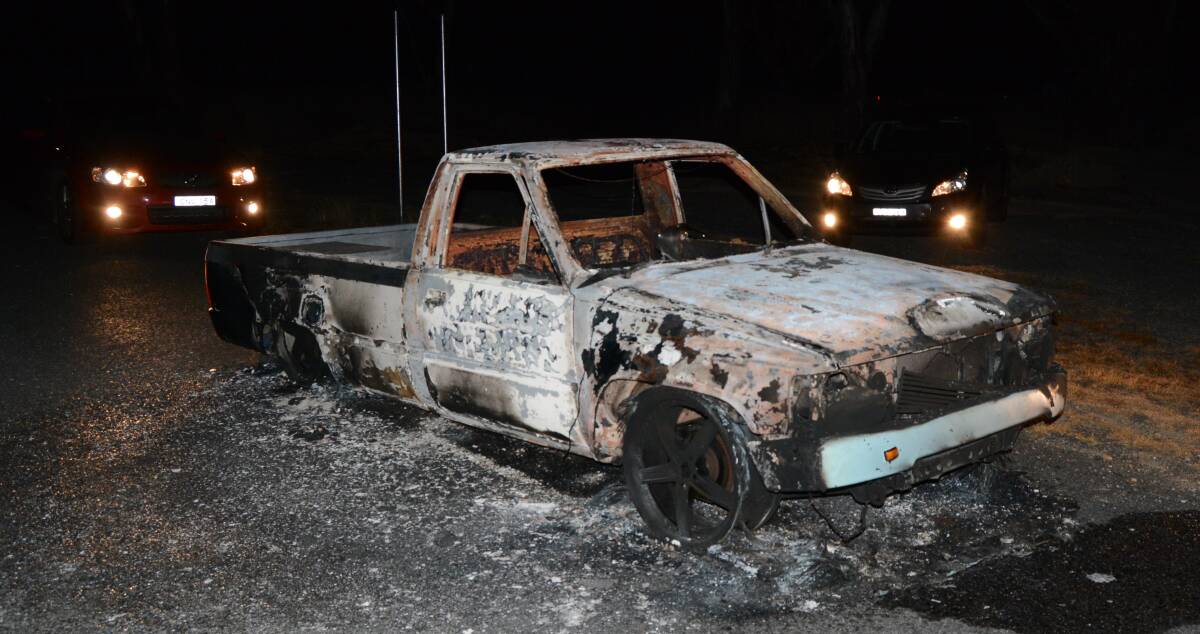 Destroyed: Austin Cook's modified 1987 Hilux was found burnt out at the corner of Neville and Carcoar Dam roads. Photo: Mark Logan