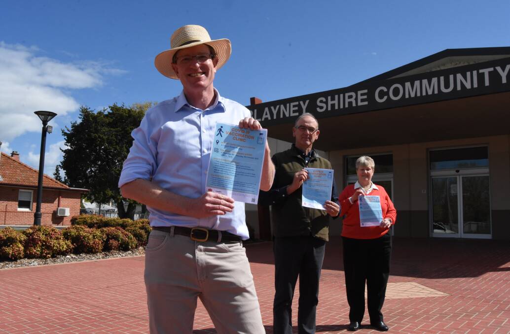 LINING UP: Andrew Gee, Scott Ferguson and Kathy Hillier outside the Blayney Community Centre, the site of the pop-up vaccination centre. Photo: Mark Logan.