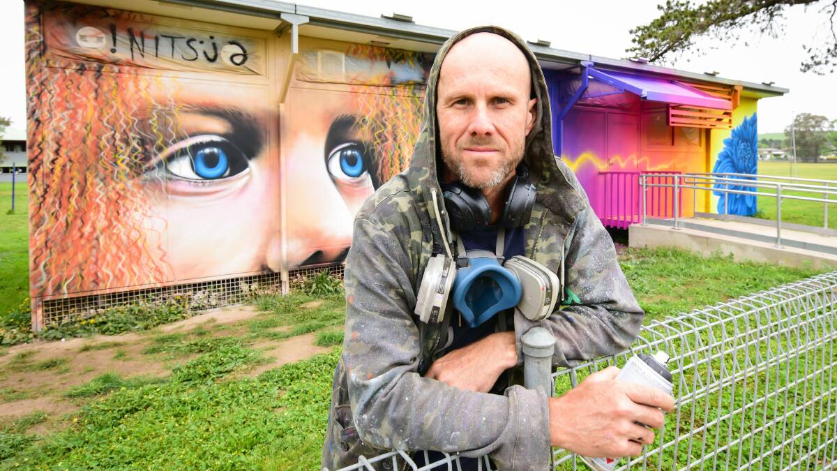 New look: NITSUA Graffiti artist from Byron Bay decorating the demountable at Blayney High School. Photo: Zenio Lapka.