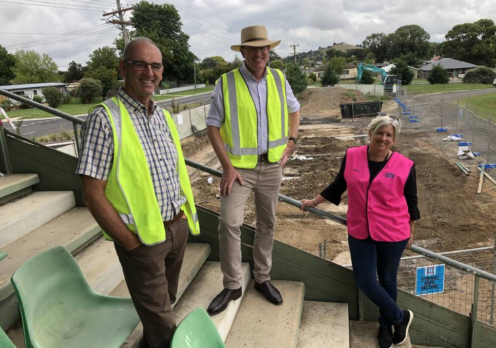 ON ITS WAY: Scott Ferguson, Andrew Gee and Rebecca Ryan were on site at King George Oval to check on the progress of the new female change rooms. Photo: Mark Logan.
