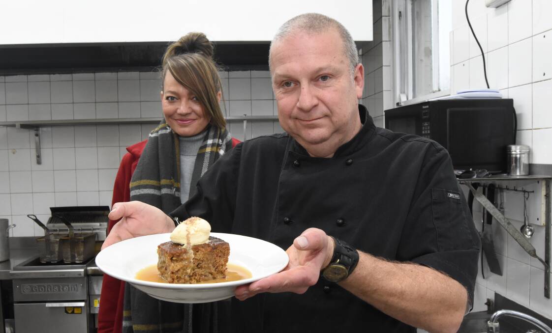 Kellie Chapman and Tony Van Loon with his popular Sticky Date Pudding. Photo: Mark Logan