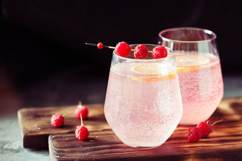 IN THE PINK: Match a pink gin with a berry shortcake or cheesecake at the end of your meal. Photos: Shutterstock
