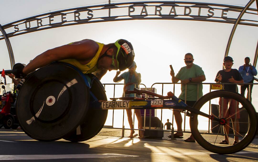 PUSHING: Kurt Fearnley pushes in races and pushes the cause of the disabled community. Photo: DANIEL McCORMACK