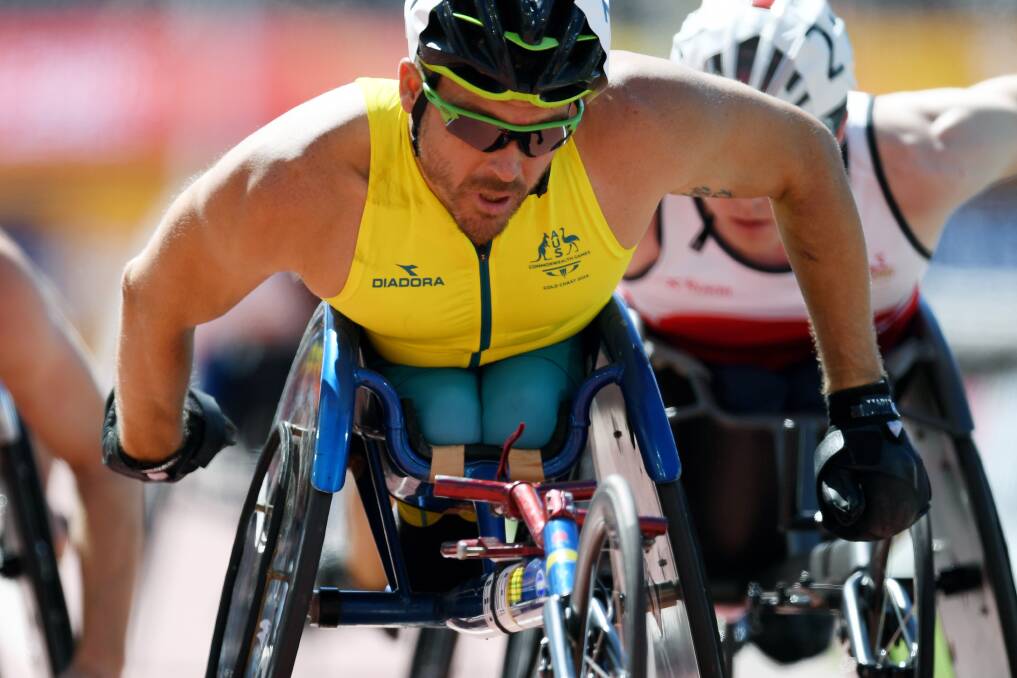 BRILLIANT EFFORT: Carcoar wheelchair racing champion Kurt Fearnley claimed silver in the men's T54 1,500 metres final at the Gold Coast Commonwealth Games on Tuesday night. Photo: AAP