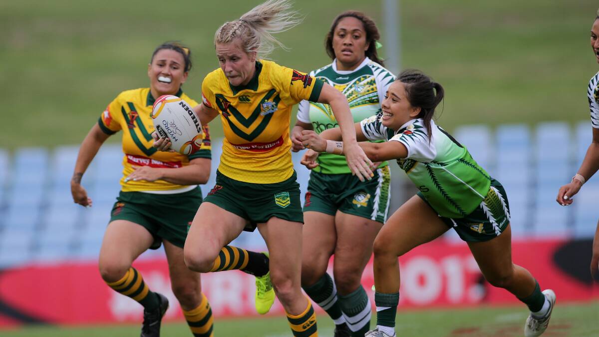 TOP HONOUR: Talesha Quinn taking on the Cook Islands during last year's Women's World Cup. Photo: JOHN VEAGE