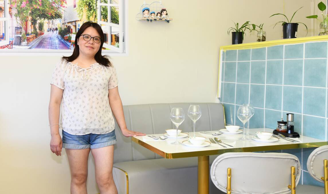 Golden Sun Asian Food Gourmet owner Angela Peng in the revamped restaurant. Picture by Jude Keogh