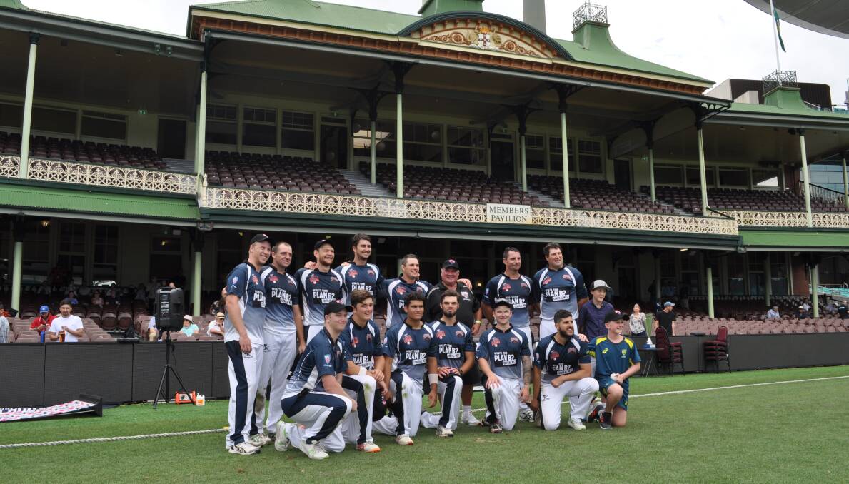 RARE CHANCE: The Central West Wranglers pose for a team shot in front of the SCG's historic members' stand. Photo: NICK McGRATH