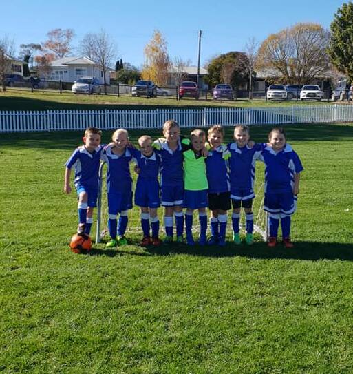 RISING: Under-8 Phoenix playing on Millthorpe's Redmond Oval on the weekend. 
