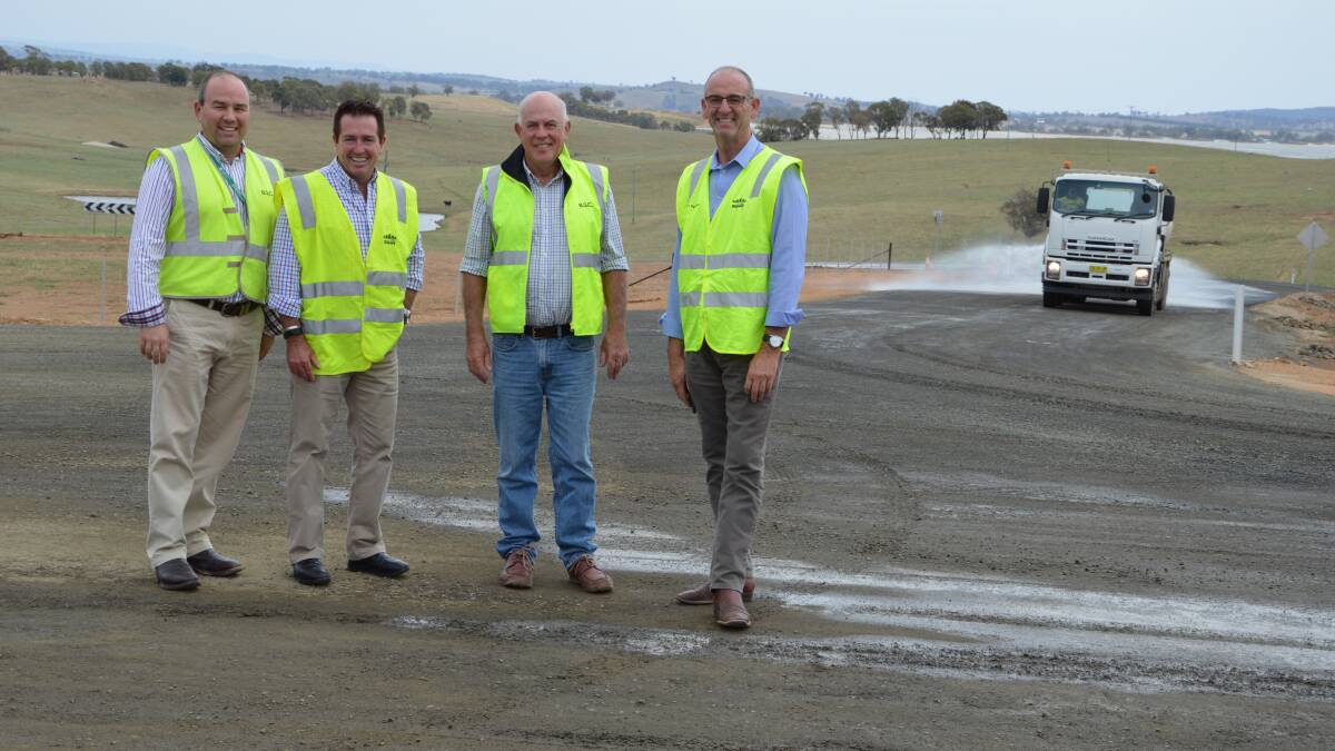 Grant Baker from Blayney Shire Council, Bathurst MP Paul Toole, Cr David
Somervaille and Mayor Scott Fergson checking progress on the Southern Cadia
Access Route which is now complete.