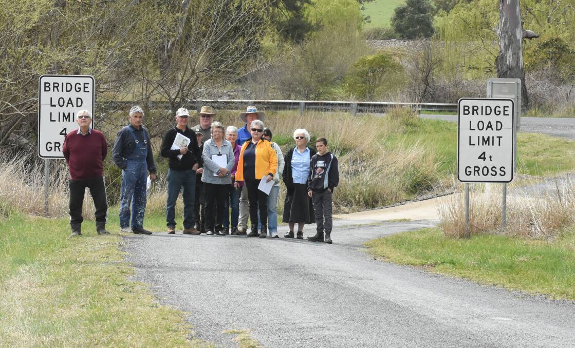 BENT STREET: Residents at the bridge site last year. Council has debated how much funding to allocate to the bridge. Photo: MARK LOGAN