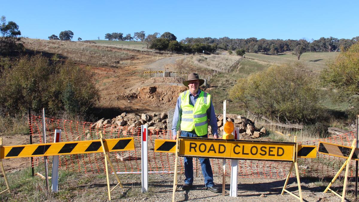 TO BE REOPENED?: Councillor Bruce Reynolds in front of the former Carcoar Street bridge. Photo: MAX STAINKAMPH