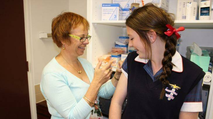 GROWING HEALTHIER: A student receiving a vaccination shot. Photo: FILE 