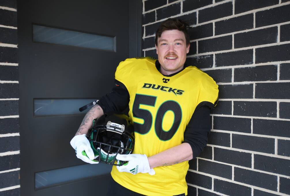 HUDDLE UP: Ian McGregor plays for the Nepean Ducks in the Gridiron NSW Competition and will be stepping it up a notch when he represents his home state. Photo: JUDE KEOGH.