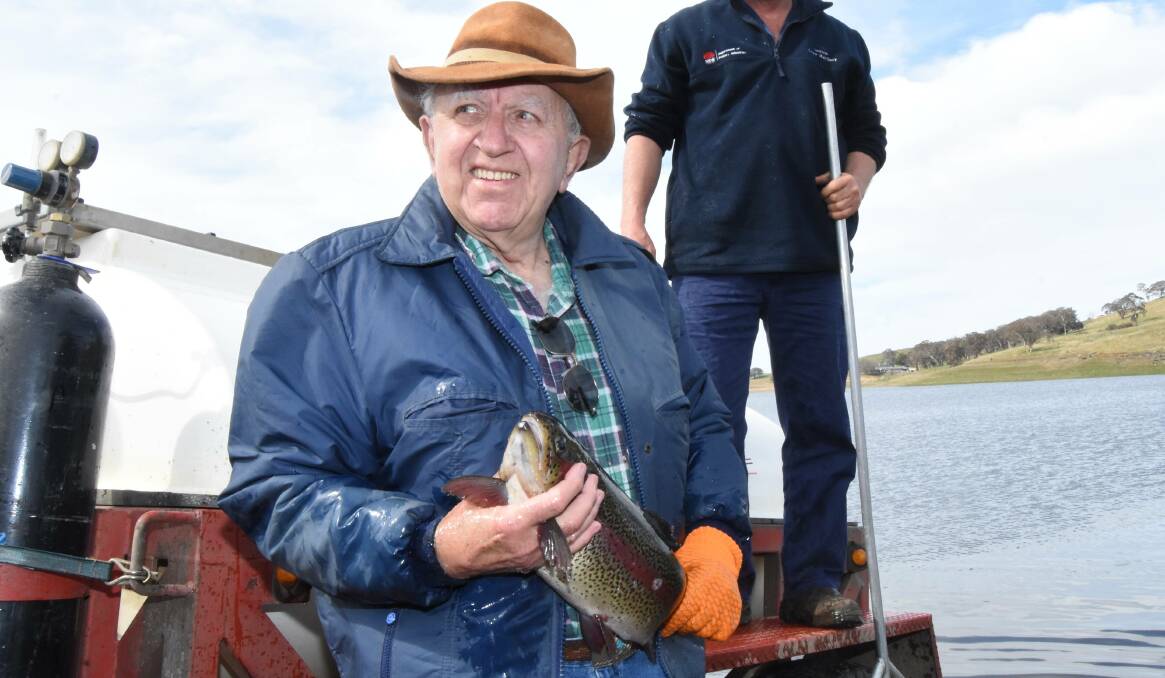 Tom Williams during the release of rainbow trout into Carcoar Dam in 2020. Picture by Mark Logan