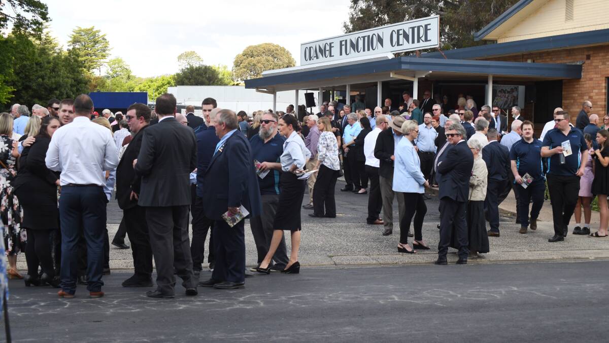 More than a thousand people gathered at the Orange Function Centre to farewell John Davis. Picture by Jude Keogh