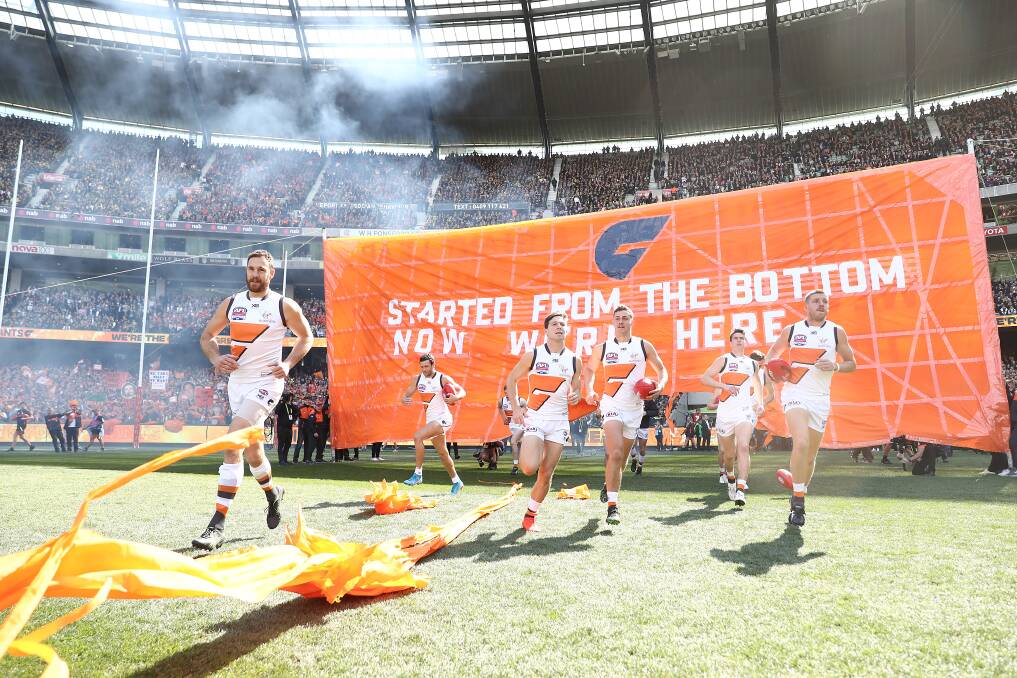 Bottom's up: GWS Giants before last year's AFL grand final. Picture: Mark Metcalfe/AFL Photos/via Getty Images