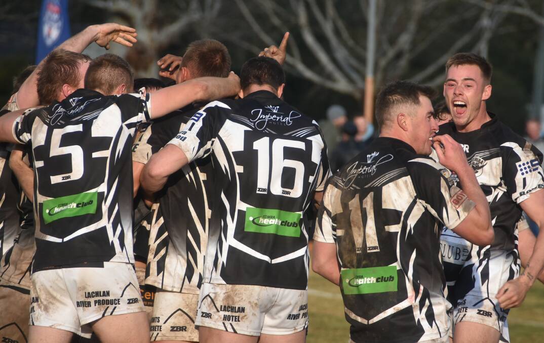 IMPORTANT TO WAIT: Cowra players celebrate making the 2018 Group 10 grand final, the club says it's important not to jump the gun and agree to a season in 2020. Photo: PETE GUTHRIE. 