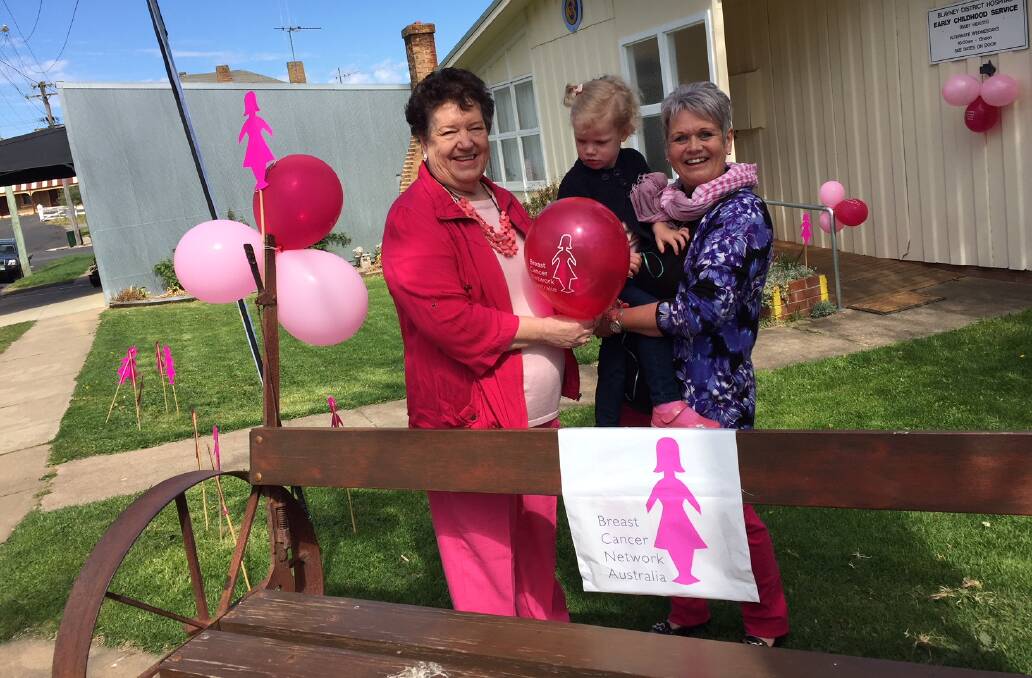 PINK RIBBON DAY: Shirley Mayfield-Moore with Kay Nixon and granddaughter Ruby
outside the Millthorpe CWA for Breast Cancer Network Australia fundraiser Morning Tea on Saturday 7 October 2017 Millthorpe.