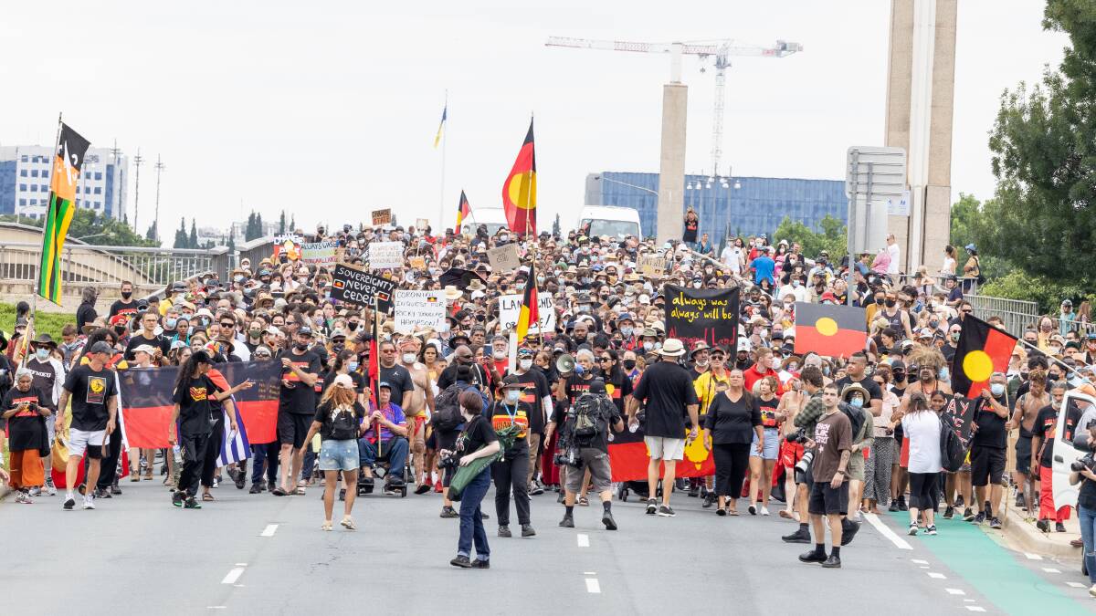 Indigenous Australians and their supporters march from Garema Place to the Aboriginal Tent Embassy on Wednesday. Picture: Sitthixay Ditthavong