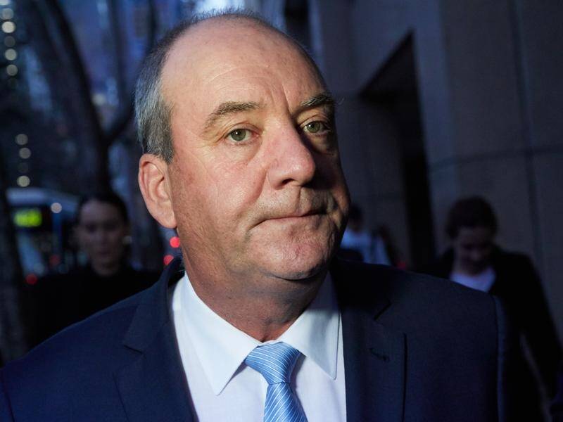 A NSW government staffer has admitted deliberately storing away ex-MP Daryl Maguire's hard drive.