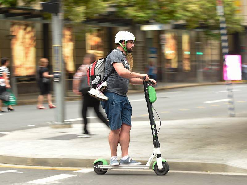 The Pedestrian Council wants e-scooters banned in Brisbane after the death of a rider.