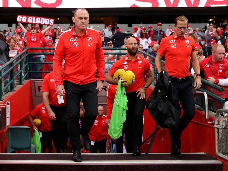 Three of Sydney coach John Longmire's assistants are clear to attend the MCG clash with Melbourne.