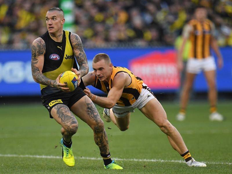 Dustin Martin (l) had 37 disposals and kicked two goals in Richmond's 95-59 win over Hawthorn.